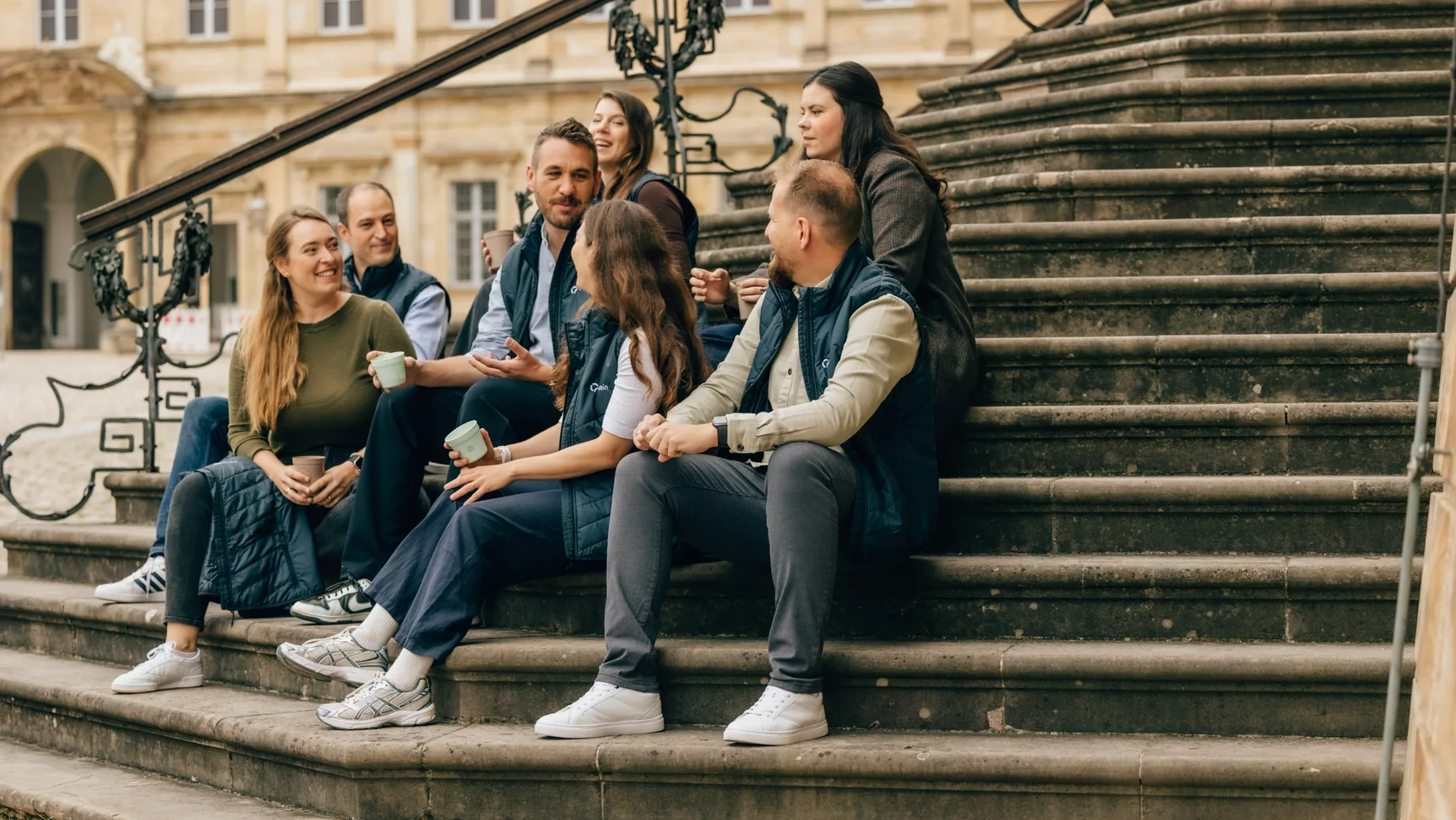 A group in conversation during an atrain session